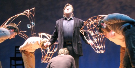 Drew Cash, University of Louisville graduate, bows down before J.R. Stuart, professional actor, as the actors playing horses — Robbie Hudgell, theatre junior, Chris Snyder, bioinformatics junior, and Phillip Rivera, theatre sophomore — bow down, as well. This play, “Equus,” was recently performed in the Robinson Theater of the Ogle Center.