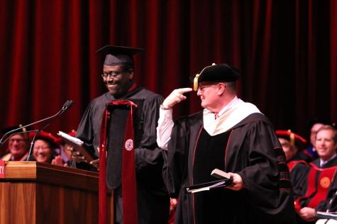 Chancellor Wallace acknowledges his wife, Susan Wallace, after he is given an IU tie by SGA President Stephon Moore. Moore said Susan Wallace gave him the idea for the gift.