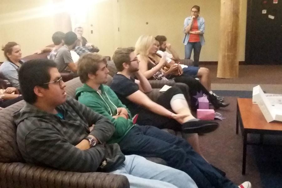 Students+listening+to+Dowling+speak+about+the+things+not+talked+about.
