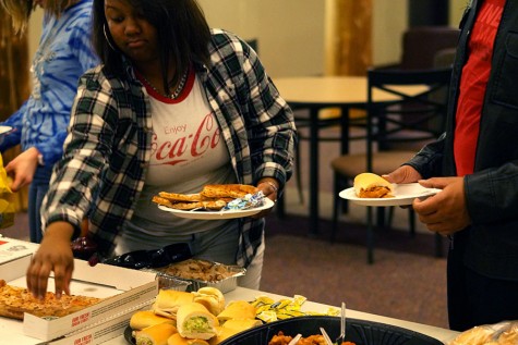 While watching the Super Bowl, Wallace provided the IU Southeast students with food.