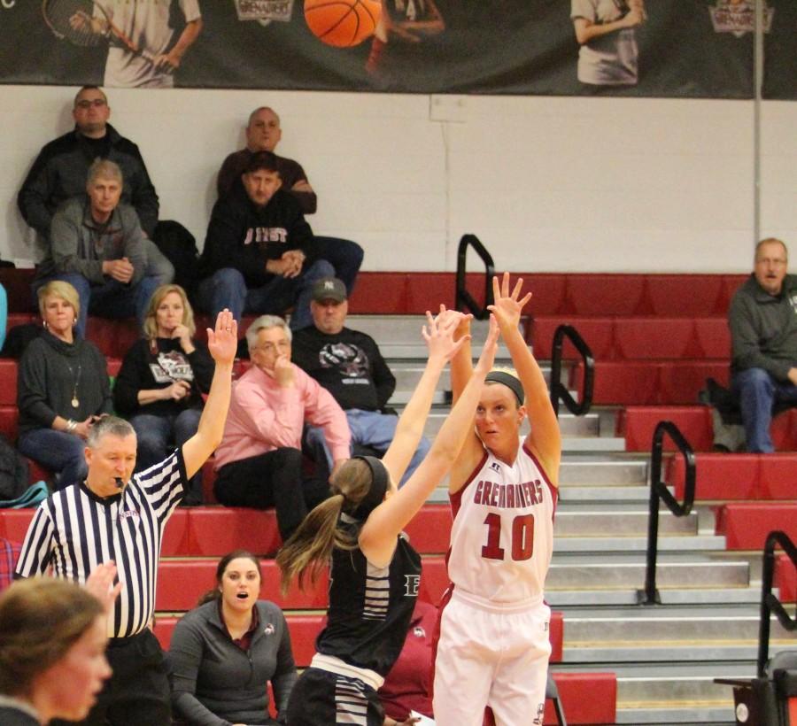 Redshirt+freshman+Josie+Hockman+shoots+a+3-point+basket.+The+Grenadiers+shot+33+percent+from+behind+the+arc.+