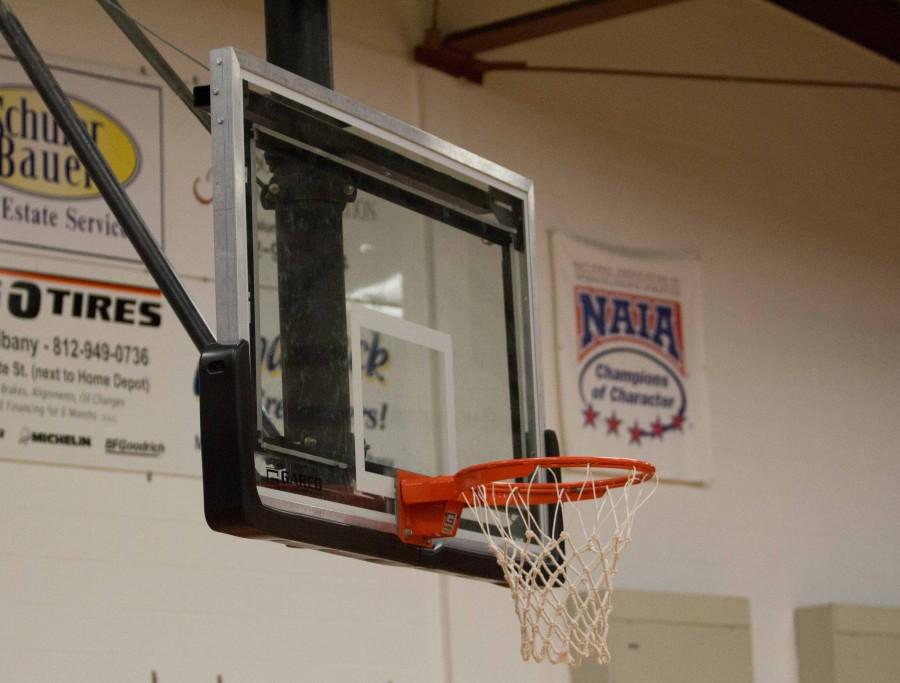 The+IUS+men%27s+senior+day+basketball+game+was+cancelled+because+of+the+rim+being+bent.+slightly+to+the+left.