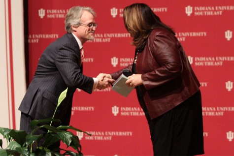 Jay White, dean of the School of Business and associate professor of finance, shakes Candy Crowley’s hand before she begins her speech. 