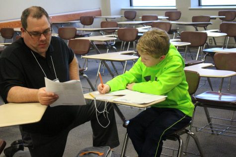 A student getting help with some math problems.