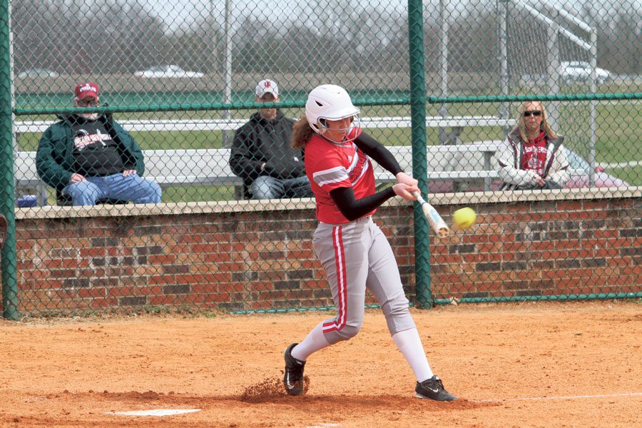 Senior+pitcher+Becca+Schoenung+hits+a+fastball+to+avoid+a+strike.+Photo+courtesy+of+IUS+Athletics%2C+used+with+permission.