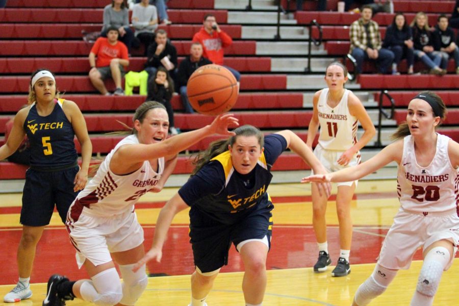 Ariana+Sandefur+%28left%29+and+WVU+Tech%27s+Logan+Dudley+rush+after+a+loose+ball+in+the+third+quarter.