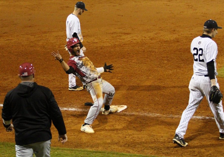 Sophomore Daunte Ducello celebrates after hitting a two-run triple in the fifth inning of the Grenadiers’ 9-5 victory over No. 25 Campbellsville, the second game of a mid-week doubleheader.