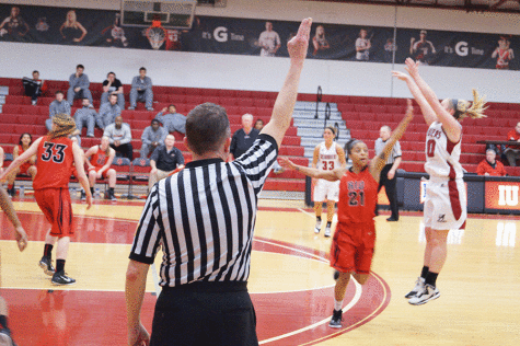 Senior guard, Heather Wheat attempts a three-pointer against Rio Grande in their 71-59 loss Tuesday night. Wheat averages 18.6 points a game.