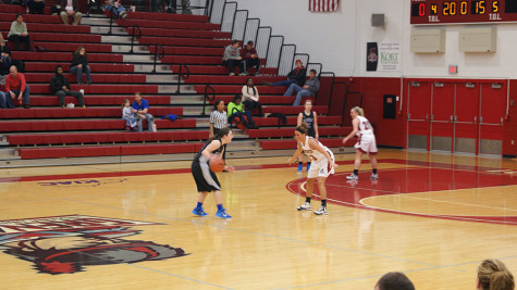 Senior guard, Megan Cureton defends against  a Midway College player on Senior night. Cureton had four steals in the win.