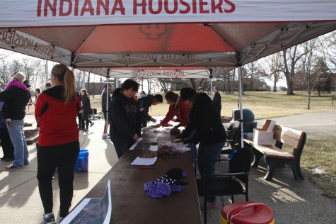 Racers sign up before the race begins.