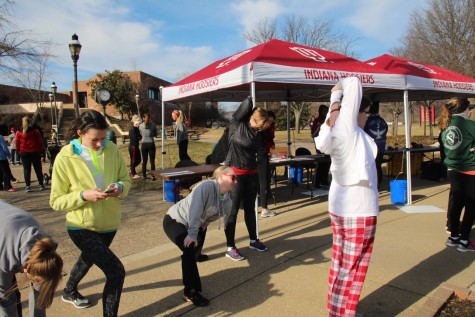 Racers stretching before the race begins.