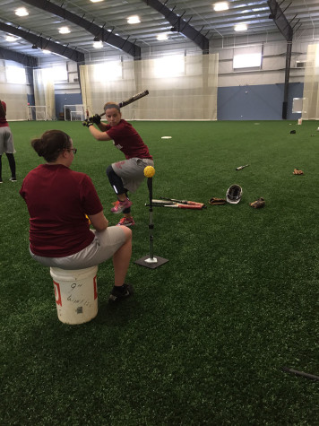  Senior captain Summer Sanders working on her hitting.