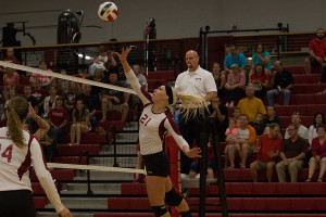 Hannah Joly, freshman outside hitter, goes up for the ball in the Grenadier's match against Point Park. Joly had a team-high 17 kills in the loss.
