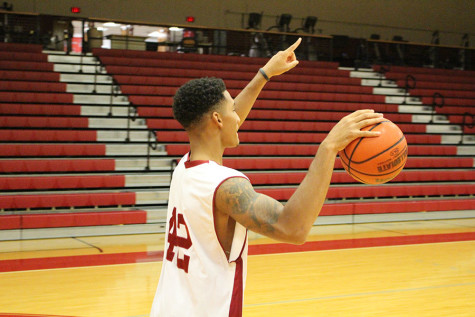 Thompson practicing in the Activies Building. He averaged 3.5 points and 5.1 rebounds per game.