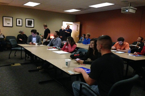 Members of the Political Science Club and College Republicans watch the Republican presidential debate on Wednesday, Oct. 28. Both clubs educate students about political candidates and the importance of voting.