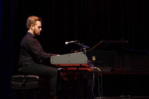 Ethan Miller, prospective music junior, plays the piano during Cold Front’s performance in Fallstock.