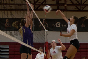 Katie Fischer, junior middle blocker, goes up to spike the ball in the regular season finale against Cincinnati Christian. Fischer had 10 kills against the Eagles. The Grenadiers now will prepare for the KIAC tournament.