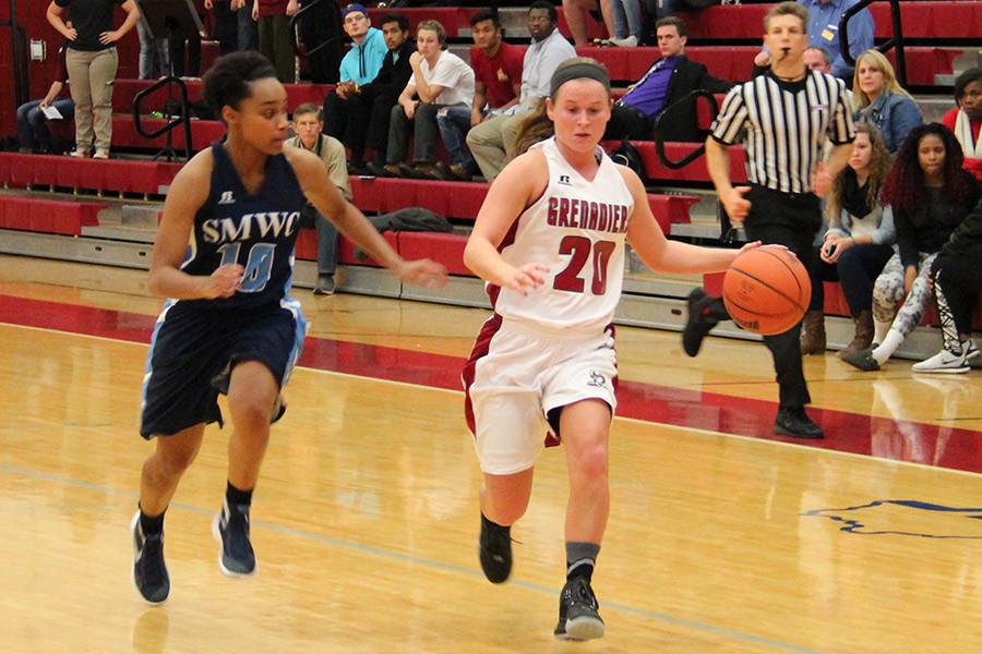 Annie+Thomas%2C+sophomore+guard%2C+dribbles+the+ball+down+the+court+against+St.+Mary-of-the-Woods+in+the+Grenadier%27s+home+opener+on+Thursday%2C+Nov.+12.+Thomas+transferred+to+IU+Southeast+this+year+from+Henderson+State+University.+She+had+a+team-high+19+points+and+five+assists+in+the+win.