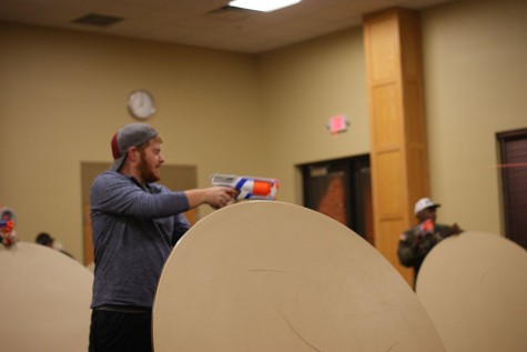 Students engage in combat during Nerf War