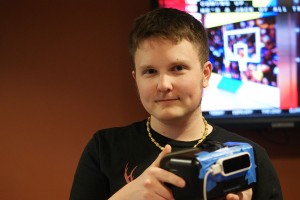 Dallas Flora, informatics senior, shows the Oculus Rift, a virtual reality system, during the Game On 1.5! technology festival. Flora was the guide during the object creation program designed by former IUS students in the informatics program. 