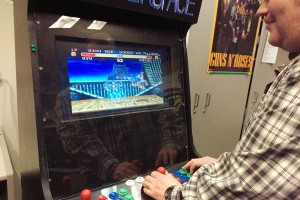 Lukas DiBeneditto, informatics senior, plays one of the “Street Fighter” games run through the arcade cabinet in the Life Sciences building. 