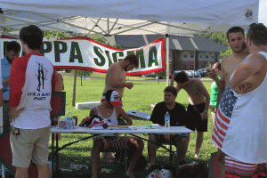 Kappa Sigma preparing for a good time and talking amongst themselves.