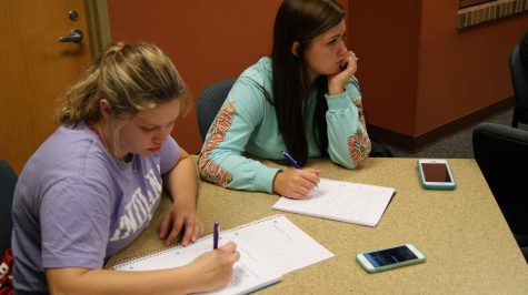 Rachael Austin, biology freshman, and Taylor Kirk, nursing freshman, carefully listen to the Plagiarism Workshop, held on Sept.28 in University Center, room 120.