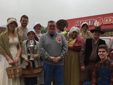 Chancellor Ray Wallace with members of the IU Southeast Theatre Department at the Harvest Homecoming Parade.