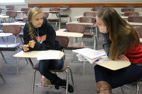 Student being taught how to do math problems.