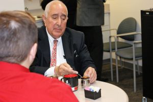 Ben Stein enjoying a cup of tea before answering a few questions for The Horizon. Stein was at IUS for the inaugural First Savings Bank Series to discuss economics in the Ogle Center on Nov. 16 at 6pm.