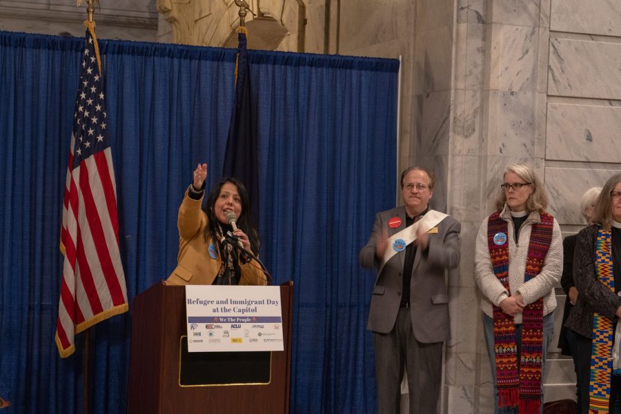 Julia Ray, events manager of Catholic Charities of Louisville closes out the rally. There were speakers from many different charities helping refugees transition to life in America, as well as testimonials from refugees in the area. 