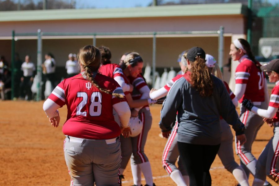 Sydney+Seger+gets+mobbed+by+teammates+after+delivering+a+walkoff+RBI+single+in+the+ninth+inning+of+game+two+of+a+doubleheader+versus+Point+Park+University.