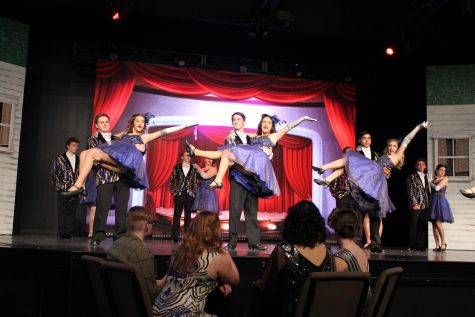 Pack your load and come down the road on Madison Theatre’s historic “Holiday Inn” journey